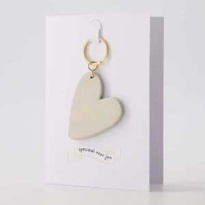 Zusss - Wenskaart Sleutelhanger Geniet - Zand